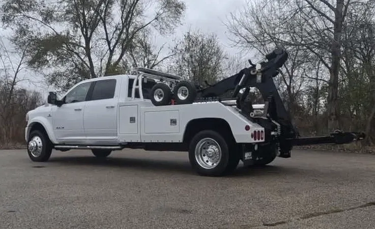 Kitchener wrecker equipment securing damaged vehicle
